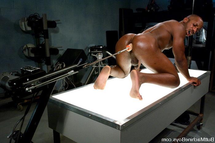 15P Black stud riding a massive ribbed dildo