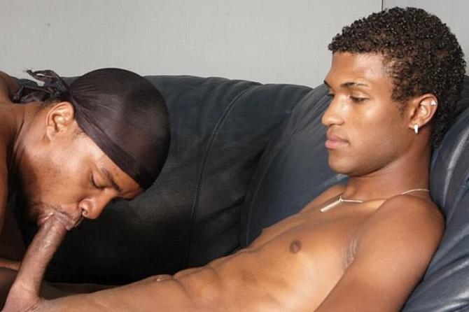20P Two ebony fellows enjoy rimming and fucking on a black sofa