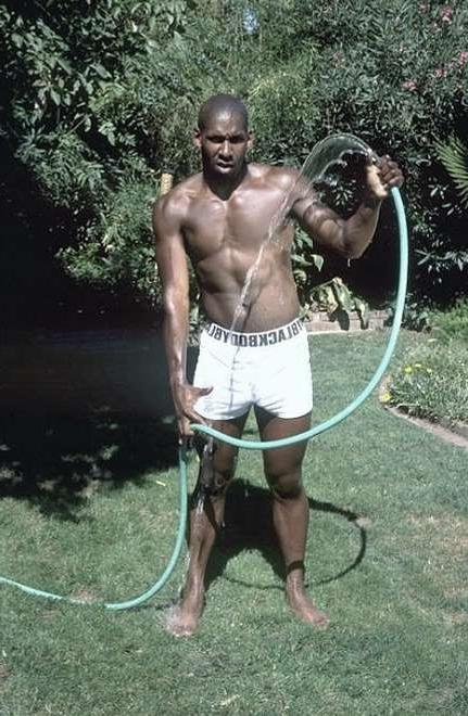 20P A black muscle gardener stripping and showing and jerking off
