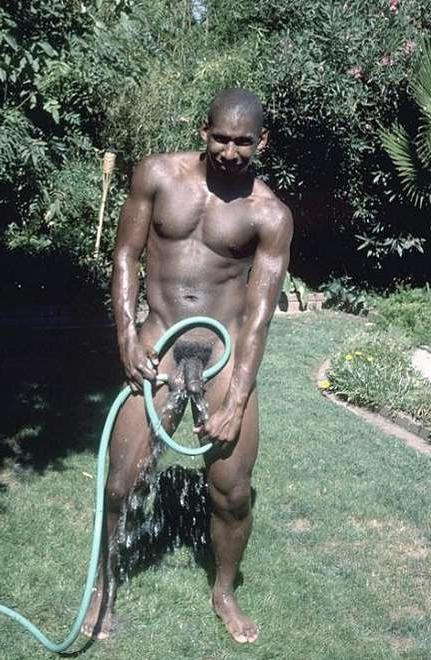 20P A black muscle gardener stripping and showing and jerking off