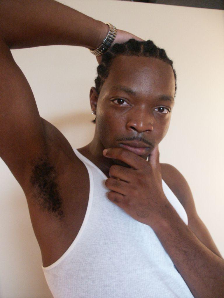 20P Horny twink black gay loves to tease while posing naked