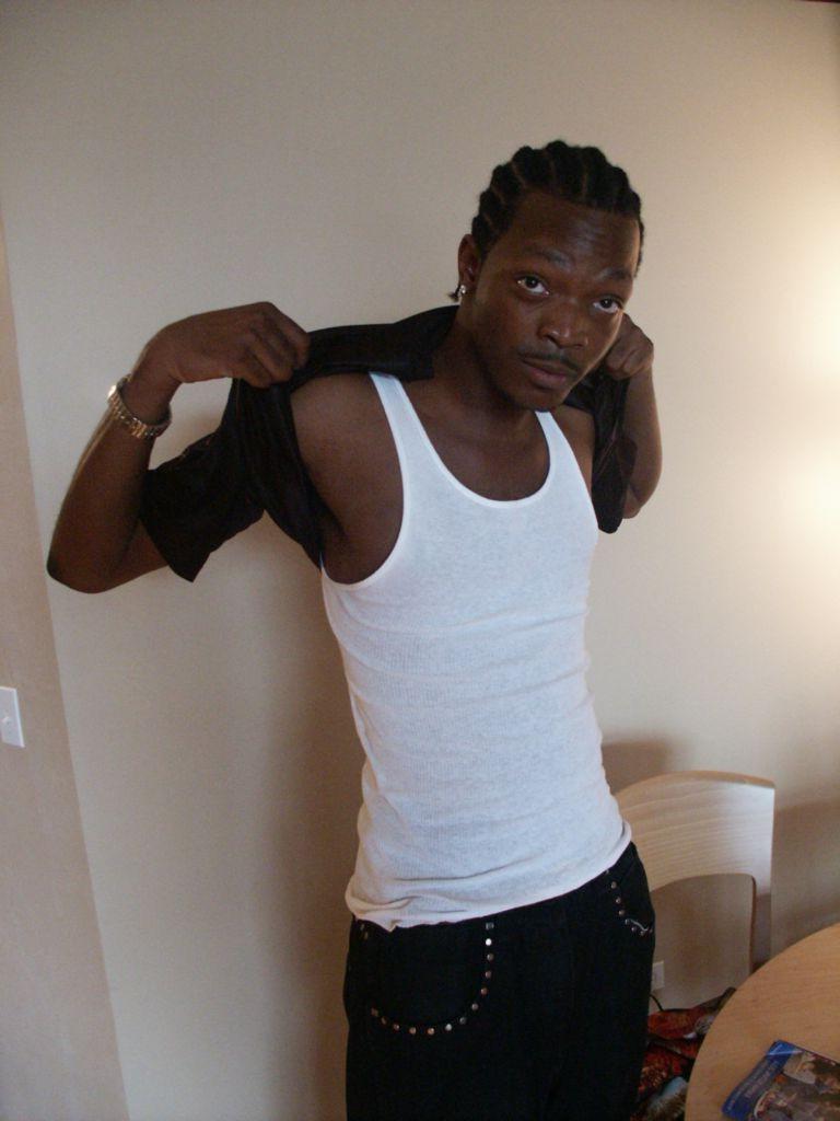 20P Horny twink black gay loves to tease while posing naked