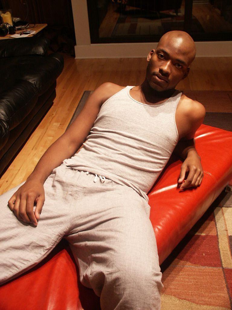 20P Horny hunk ebony gay loves to striptease while posing naked