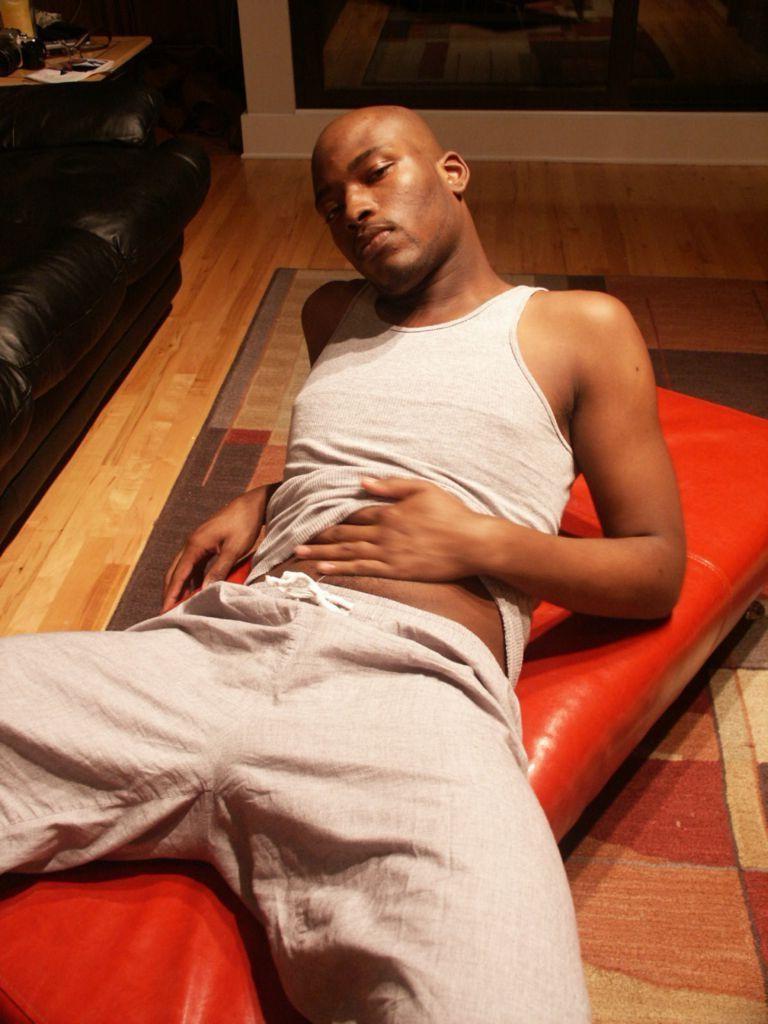 20P Horny hunk ebony gay loves to striptease while posing naked