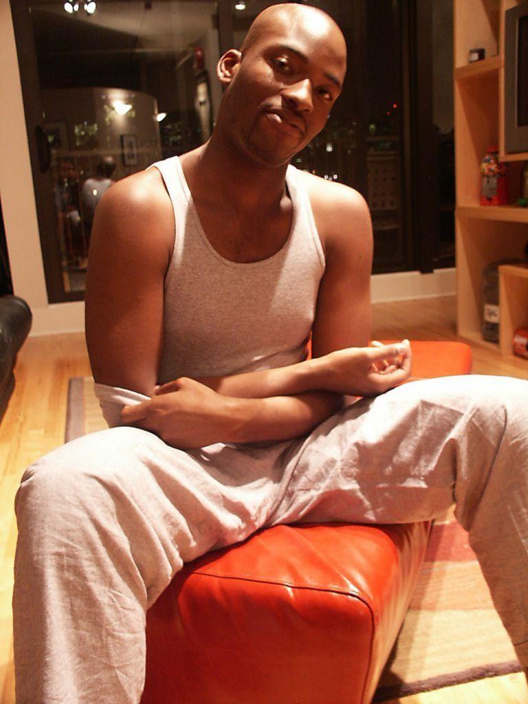 20P Horny hunk ebony gay loves to striptease while posing naked