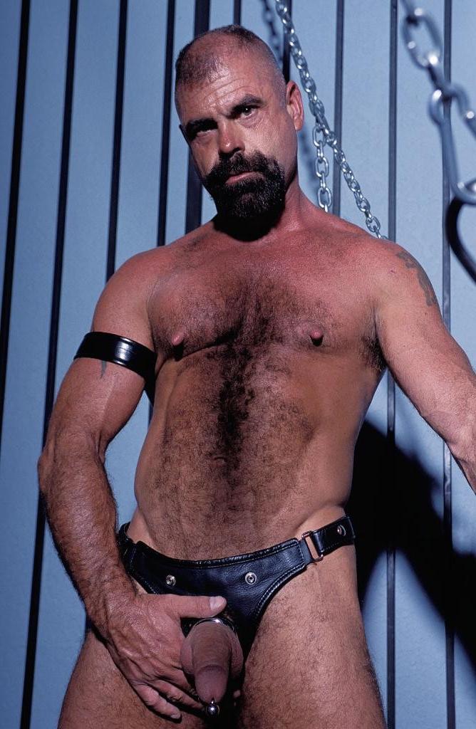 20P Teasing hairy gay in leather love flashing his pierced cock
