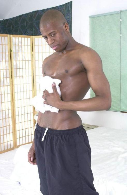 16P Muscular ebony gay stripping and stroking his big cock