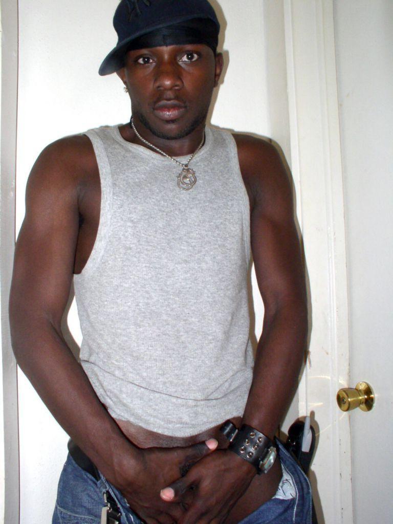 20P Strip teasing ebony gay loves grabbing his huge fat cock