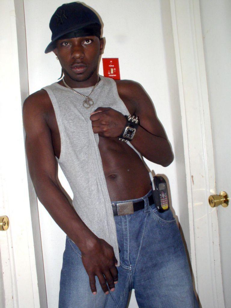 20P Strip teasing ebony gay loves grabbing his huge fat cock