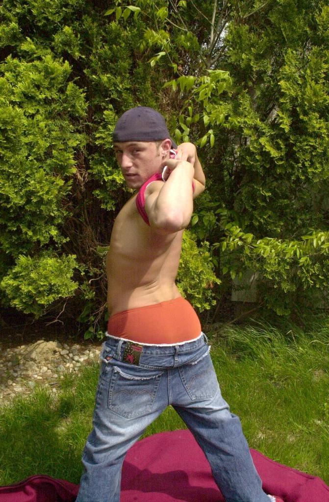 20P Outdoor horny gay twink strip teasing and spreading his ass