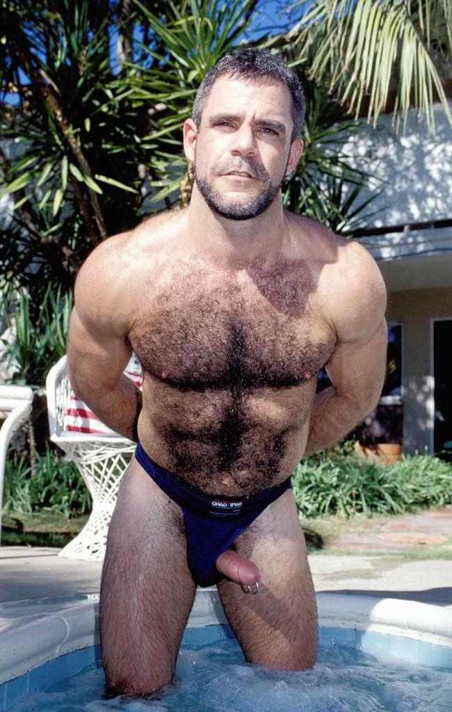 20P Teasing hairy gay in a jacuzzi flashing his pierced cock