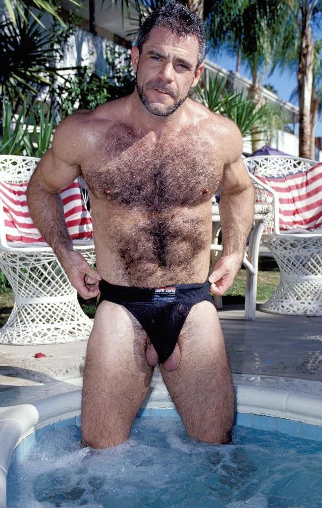 20P Teasing hairy gay in a jacuzzi flashing his pierced cock