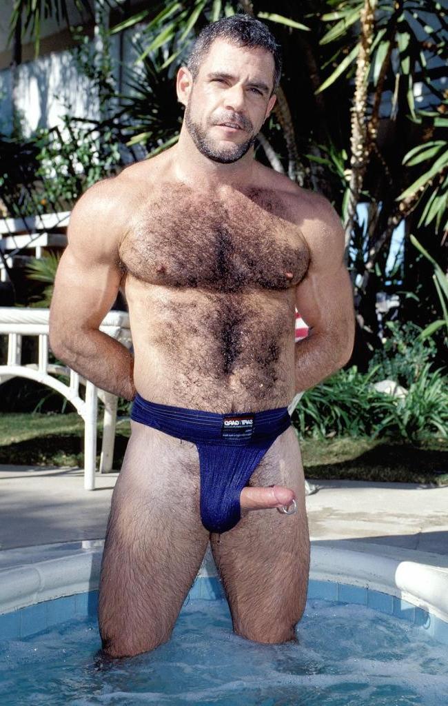 20P Teasing hairy gay in a jacuzzi flashing his pierced cock