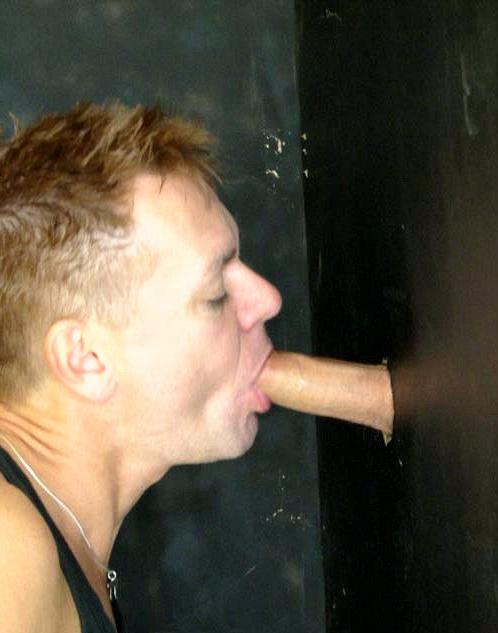 16P Gay guys sucking jocks through a hole in the wall