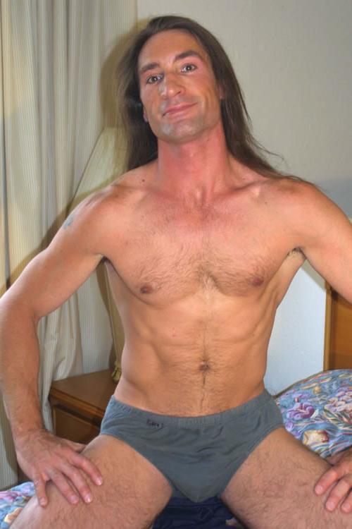 20P Hairy brunette gay in bed showing his cock