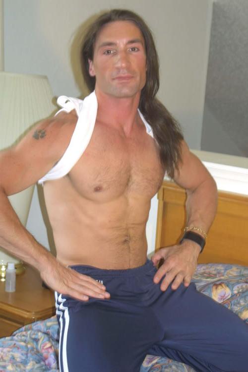 20P Hairy brunette gay in bed showing his cock