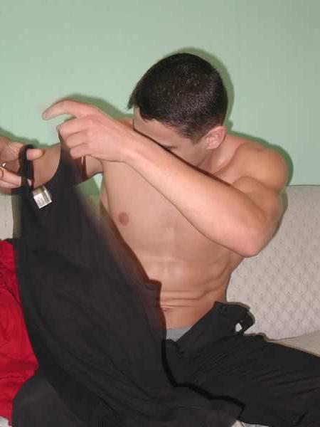 13P Muscular hunk naked in a living room