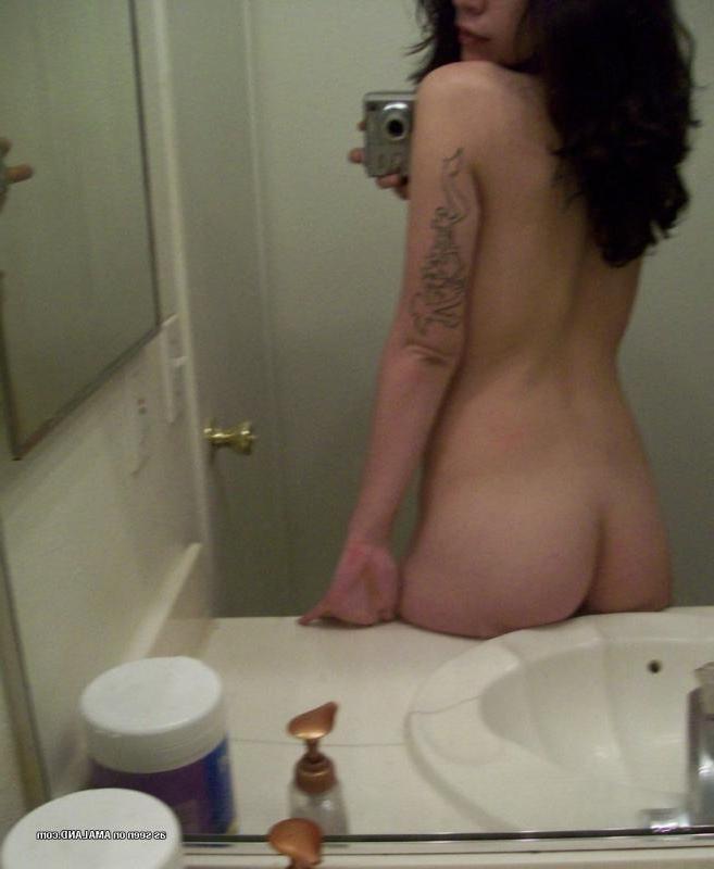 14P Tattooed Spanish hottie strips naked while selfhooting