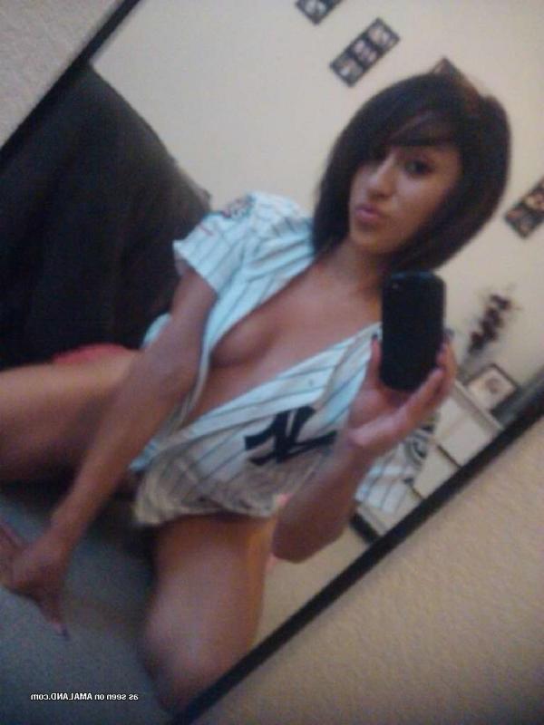 14P Slutty Spanish chick shows off her sexy tight body