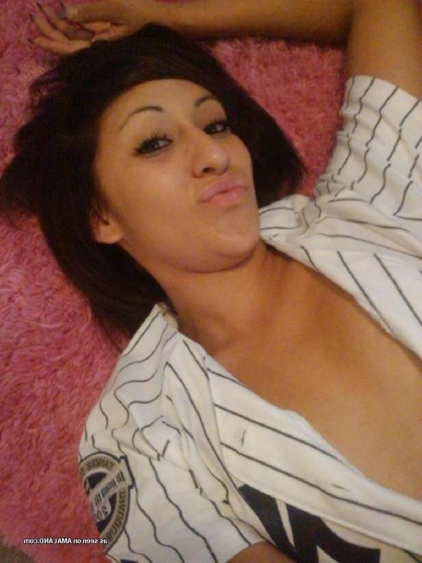 14P Slutty Spanish chick shows off her sexy tight body