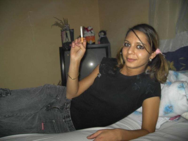 14P Slutty Spanish bitch strips naked and gets wild