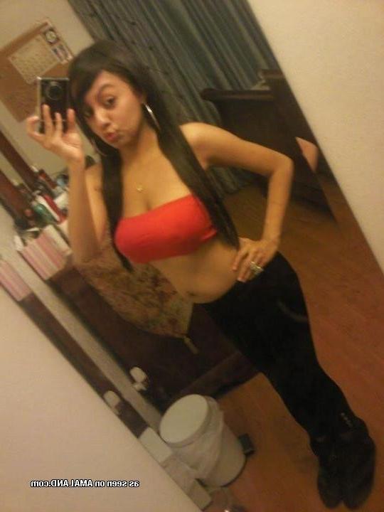 9P Spanish babe displays her big tits in various sexy clothes