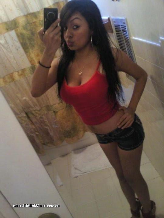 9P Spanish babe displays her big tits in various sexy clothes