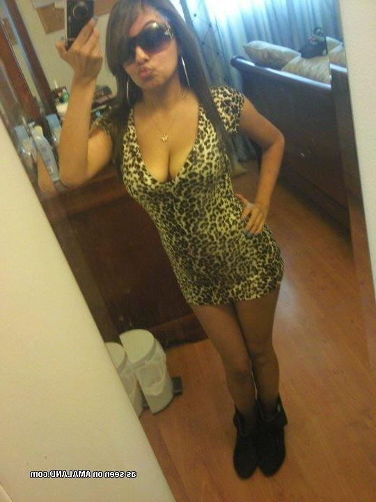 9P Spanish babe displays her big tits in various sexy clothes