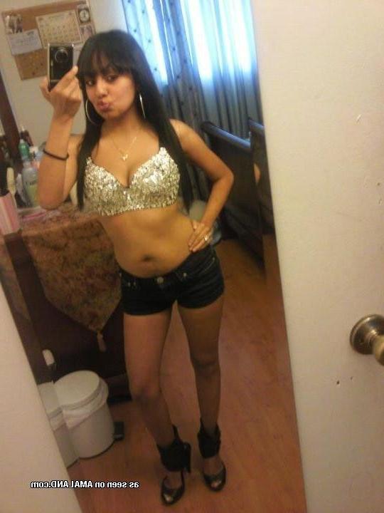 9P Spanish babe displays her big tits in various sexy clothes