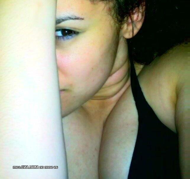 14P Collection of a busty Spanish babe camwhoring at home