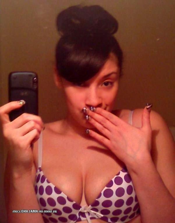 14P Collection of a busty Spanish babe camwhoring at home