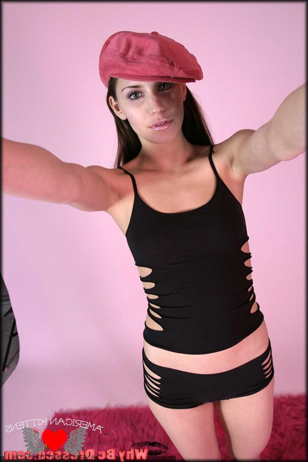 18P Bridget wearing a pink hat and taking everything off so we can see her tight lit