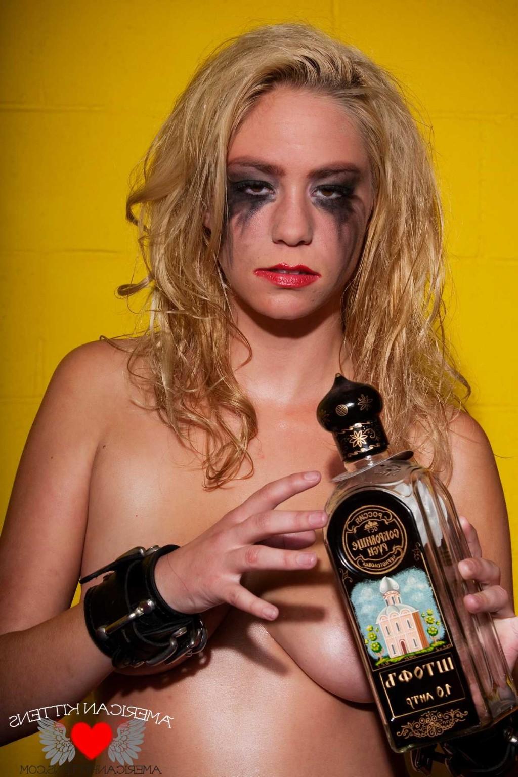 18P Bella baby oil and bondage and a bottle of water that looks a lot like vodka who