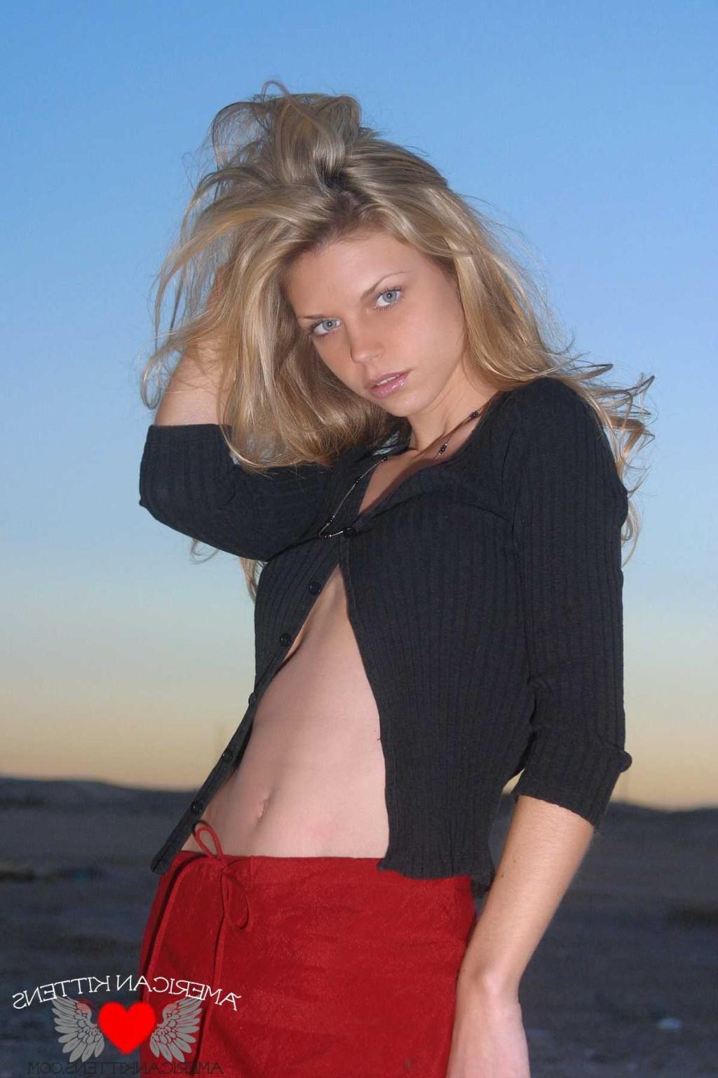 18P Ashley outside black top red long skirt