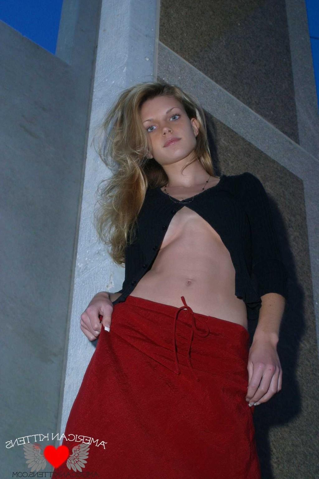 18P Ashley outside black top red long skirt