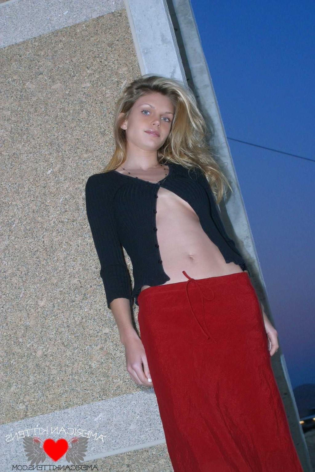 18P Ashley outside black top red long skirt