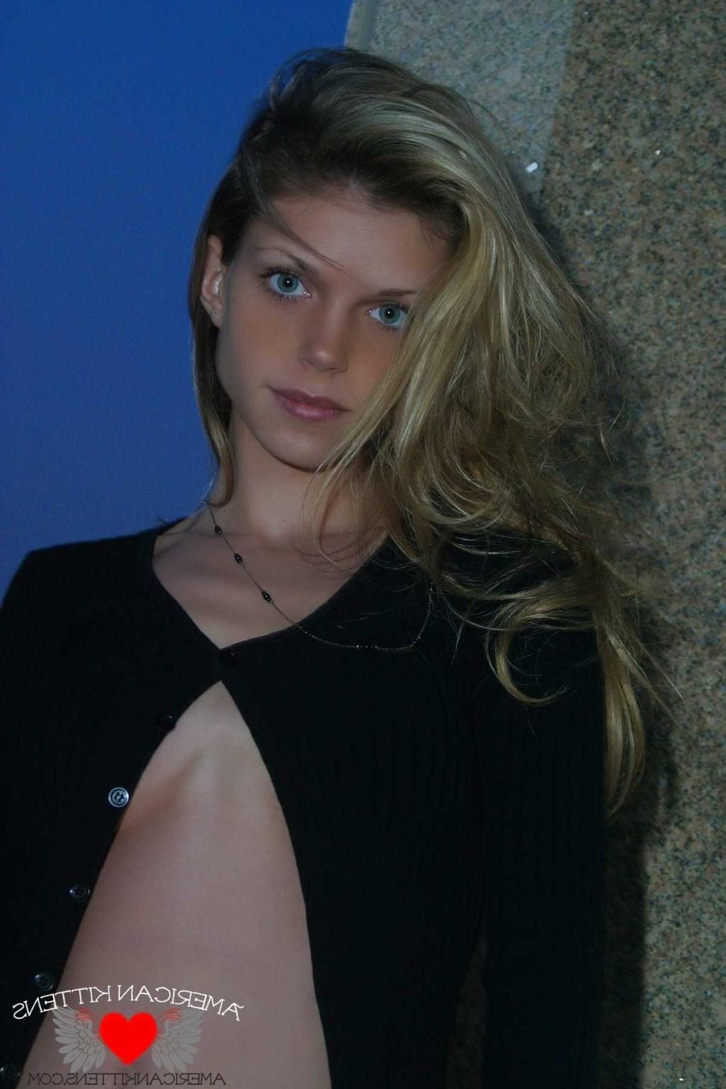 18P Ashley outside black top red long skirt