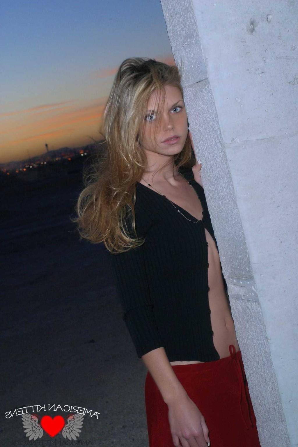 18P Ashley outside black top red long skirt