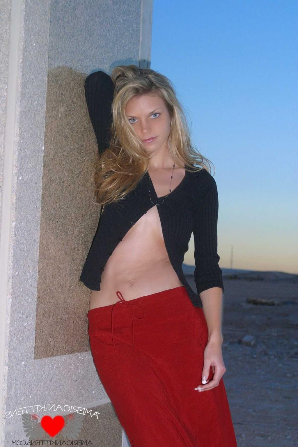 18P Ashley outside black top red long skirt