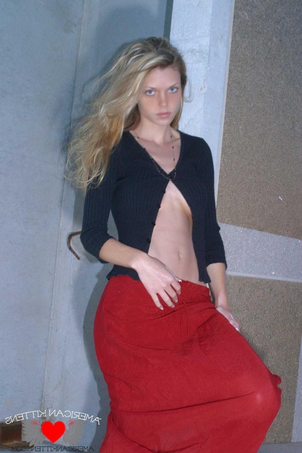 18P Ashley outside black top red long skirt