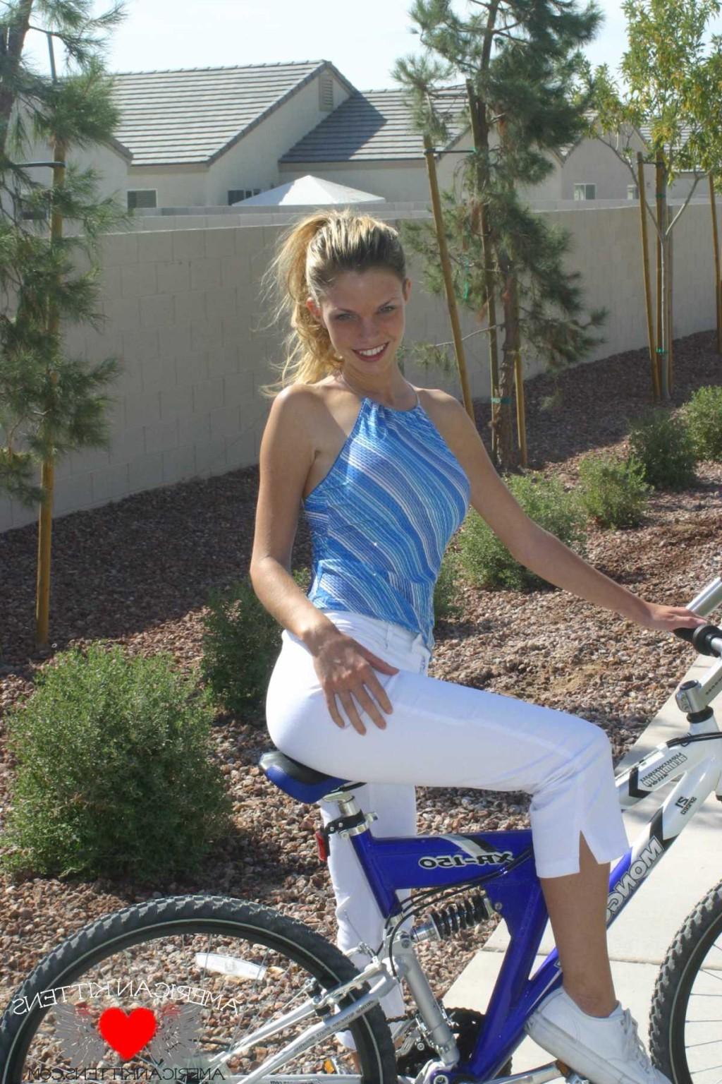 17P Ashley a blonde on a bike wearing white pants hot hot hot