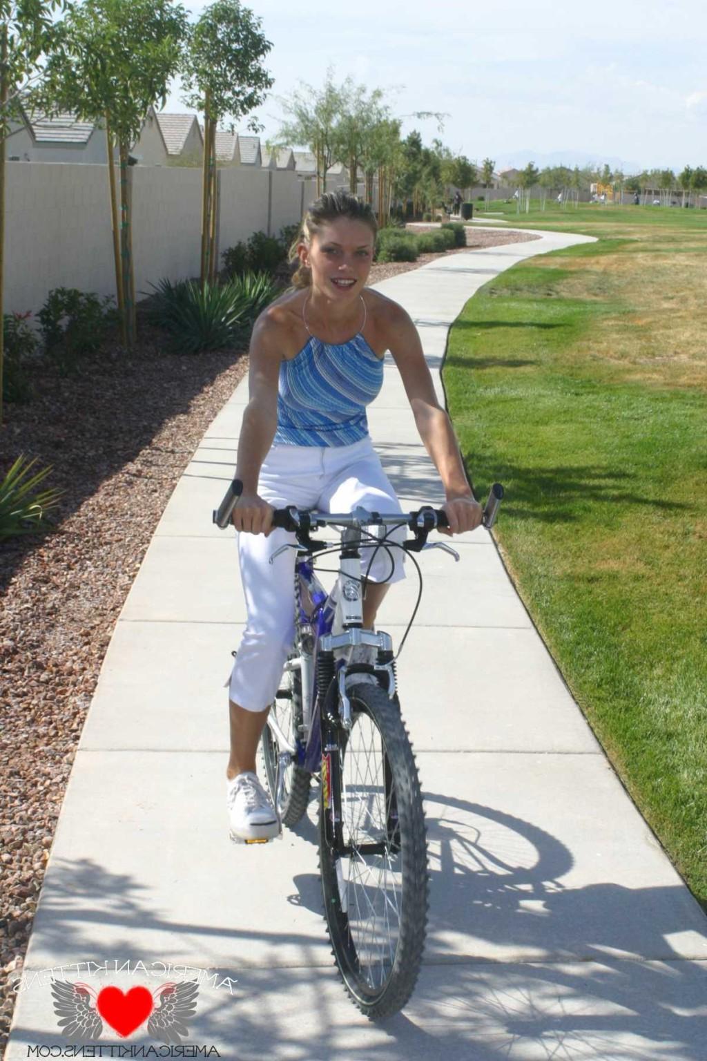17P Ashley a blonde on a bike wearing white pants hot hot hot