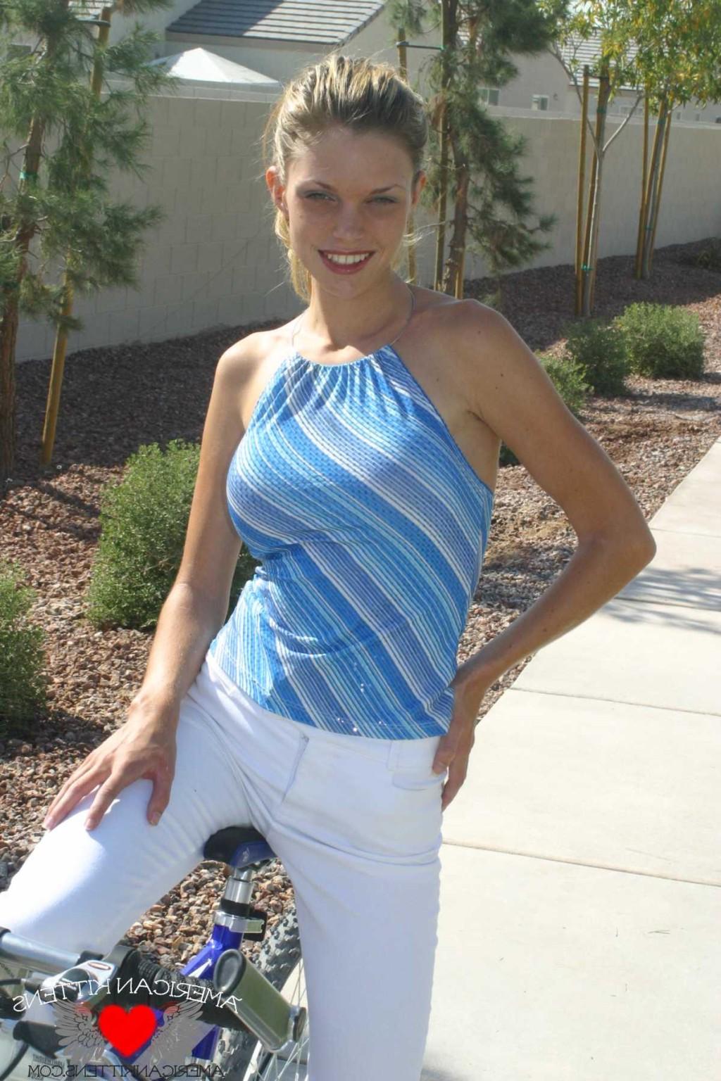 17P Ashley a blonde on a bike wearing white pants hot hot hot
