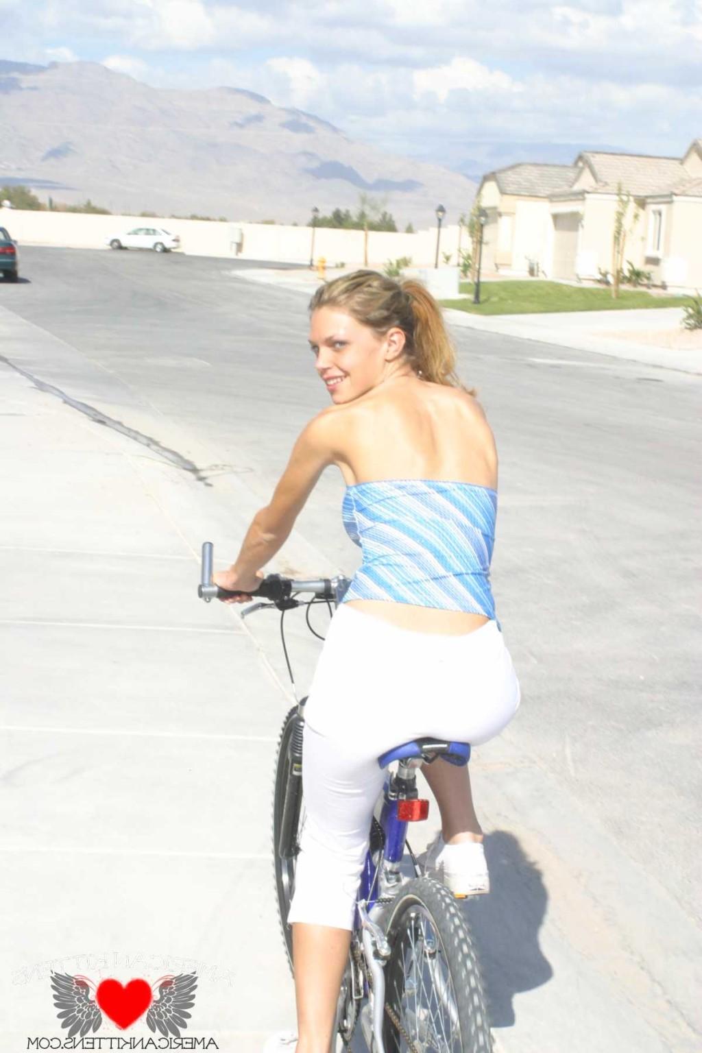 17P Ashley a blonde on a bike wearing white pants hot hot hot