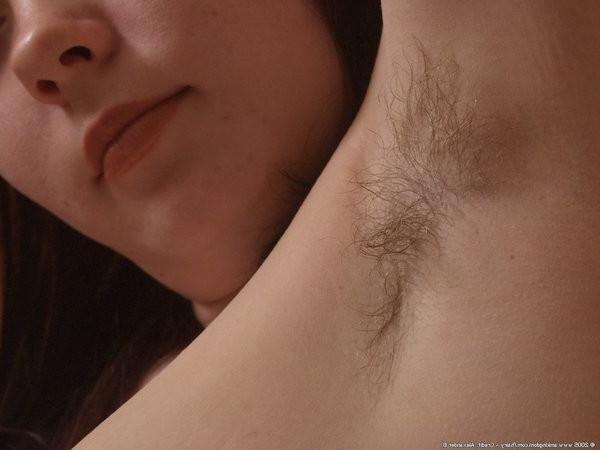 15P Redhead Anna shows off her healthy natural boobs and hairy pussy