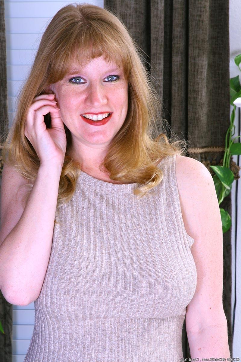 15P Horny milf with massive natural boobs strips and spreads