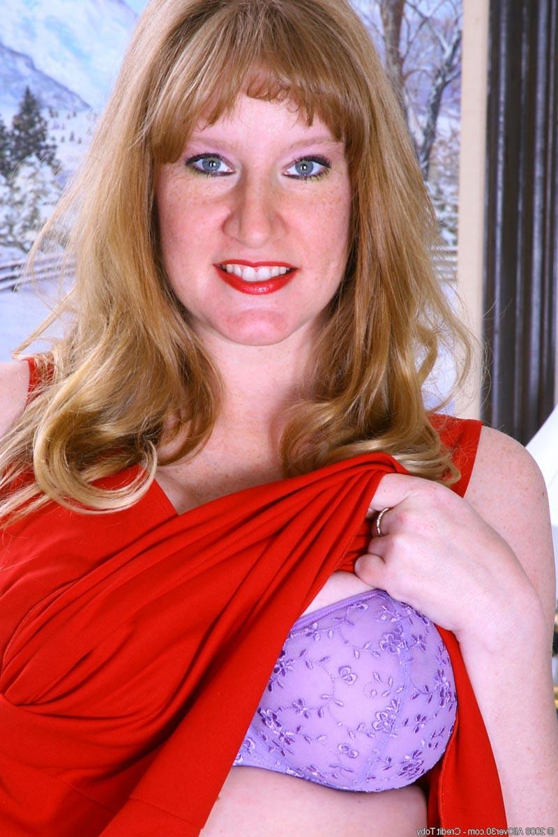 15P Horny milf with massive natural melons spreading pussy