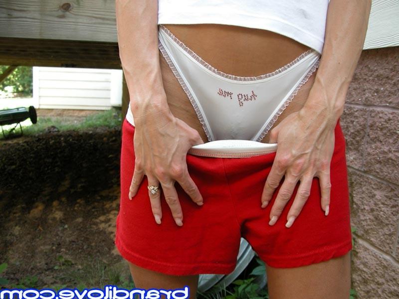 15P Hot slim MILF teasing in her garden
