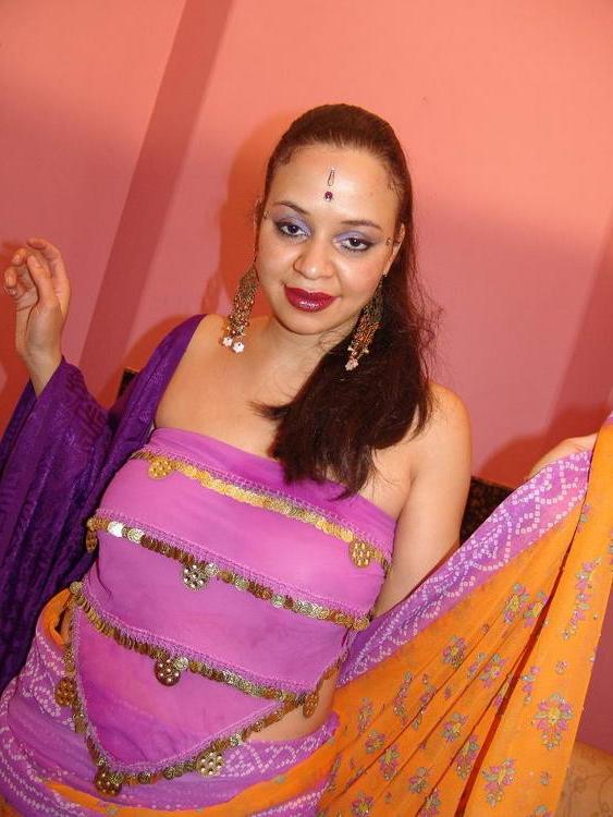 15P Busty Indian Lasmi lifts her legs high to show off her trimmed bushy bang hole