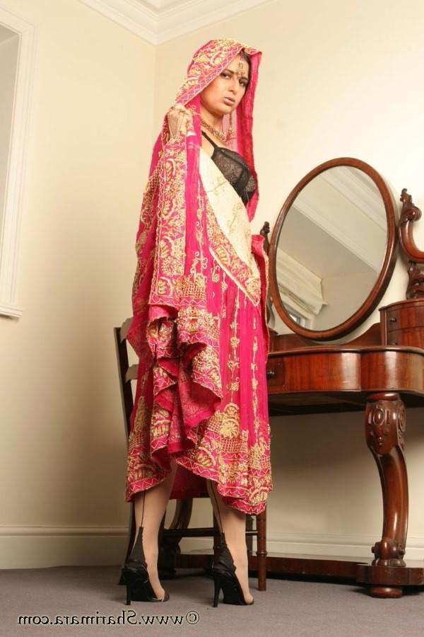12P Indian babe spreding her stockinged legs